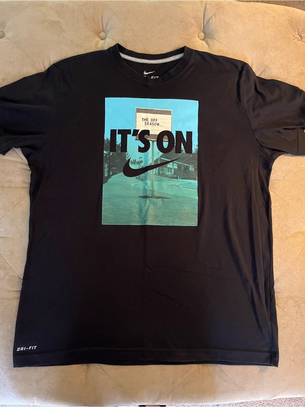 Nike Black Short-Sleeve Graphic Tee with Turquoise Panel